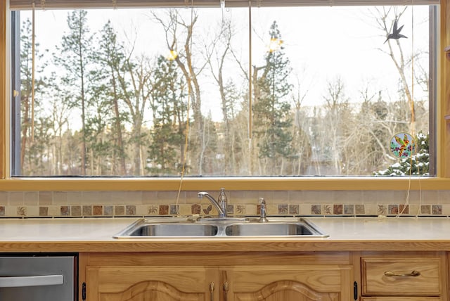 kitchen with sink and light brown cabinets