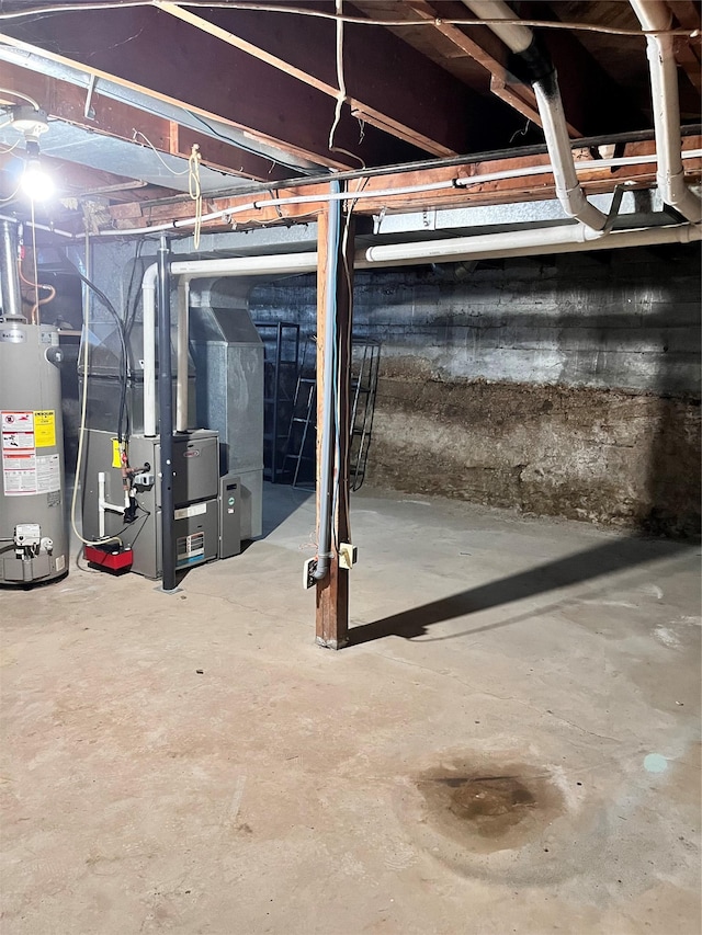 basement with water heater and heating unit