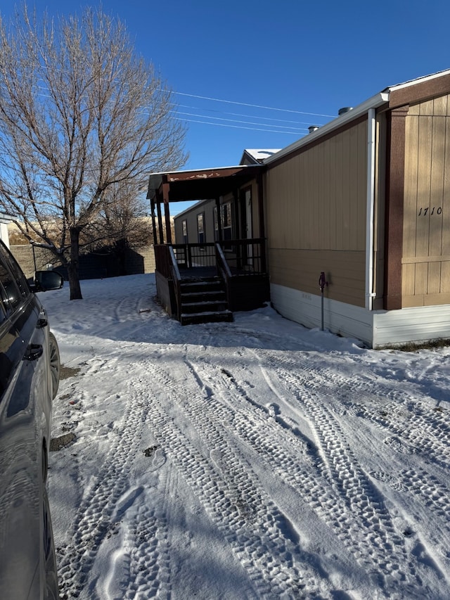 view of snow covered property