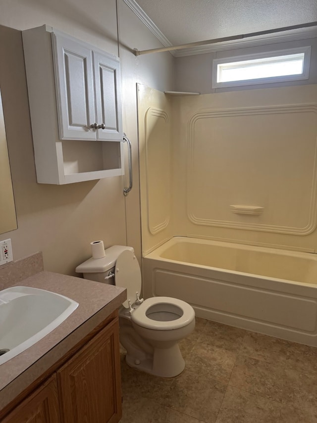 full bathroom with ornamental molding,  shower combination, toilet, and vanity