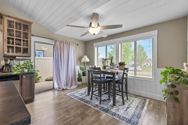 dining space with hardwood / wood-style flooring, ceiling fan, vaulted ceiling, and wooden ceiling