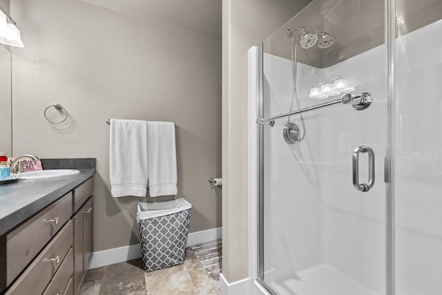 bathroom with vanity and walk in shower