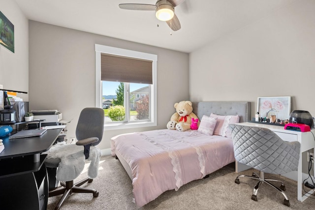 carpeted bedroom featuring ceiling fan