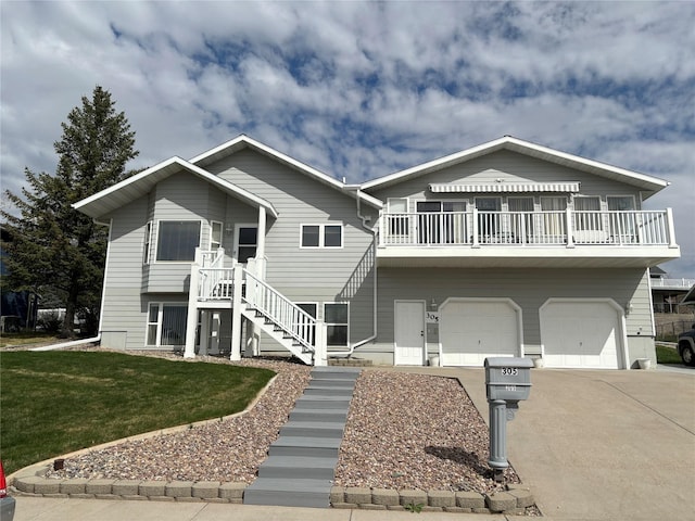 view of front of house featuring a garage and a front lawn