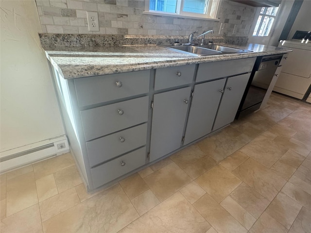 kitchen featuring a baseboard radiator, sink, decorative backsplash, and gray cabinetry