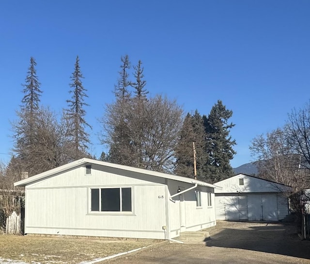 view of property exterior featuring a garage