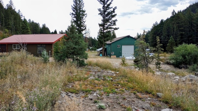 view of yard with a garage