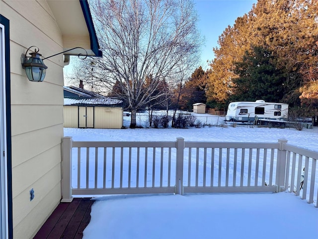 view of snow covered deck