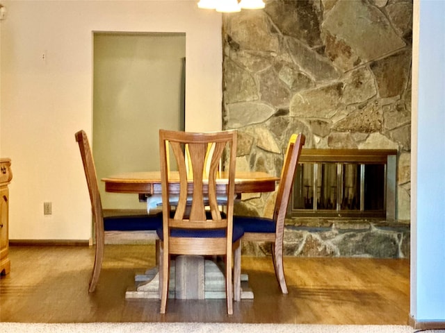 dining area featuring a fireplace