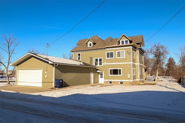 view of side of property featuring a garage