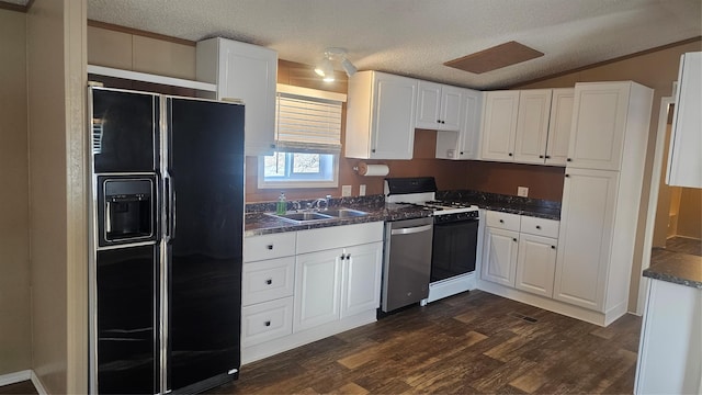 kitchen featuring white cabinetry, sink, stainless steel dishwasher, gas stove, and black fridge