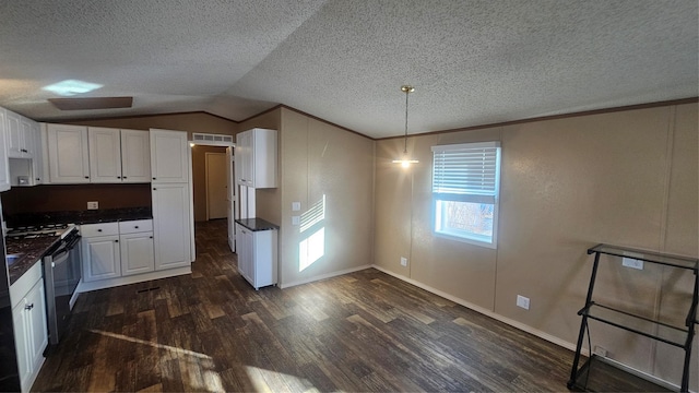 kitchen featuring white cabinetry, vaulted ceiling, dark wood-type flooring, and decorative light fixtures