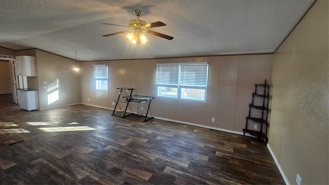 unfurnished room with lofted ceiling, crown molding, a wealth of natural light, and dark hardwood / wood-style floors