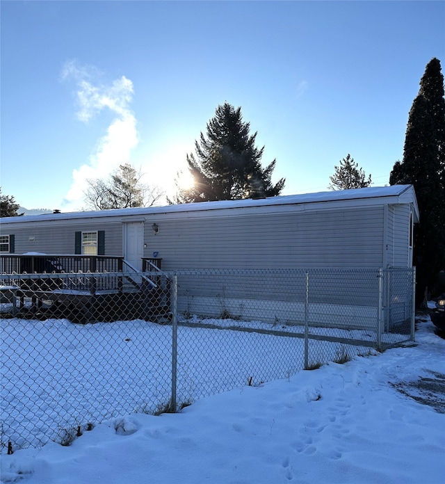 view of snow covered house