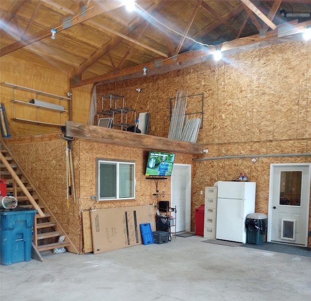 garage with white refrigerator