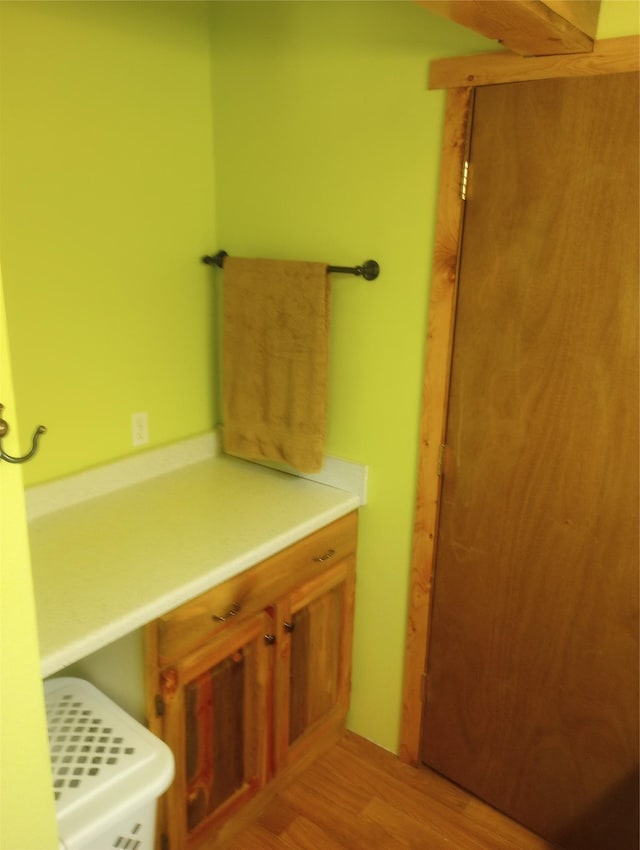 bathroom featuring hardwood / wood-style flooring