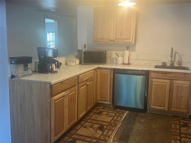 kitchen featuring dishwasher and sink