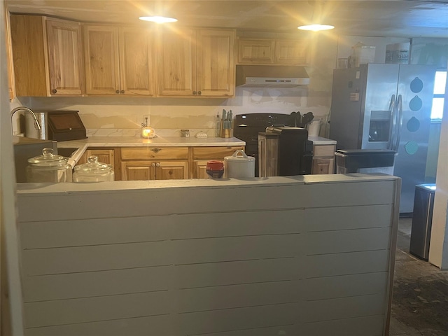 kitchen with light brown cabinetry