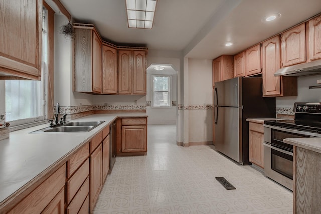 kitchen with stainless steel appliances and sink