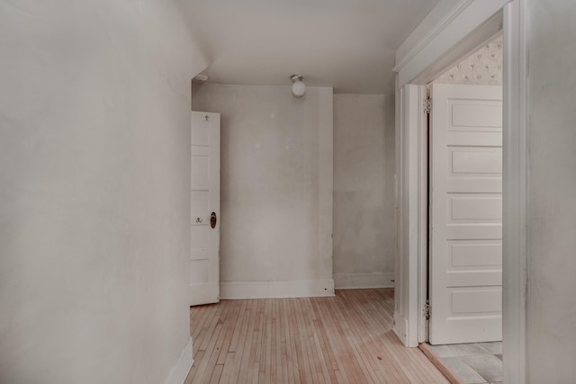 hallway featuring light hardwood / wood-style flooring