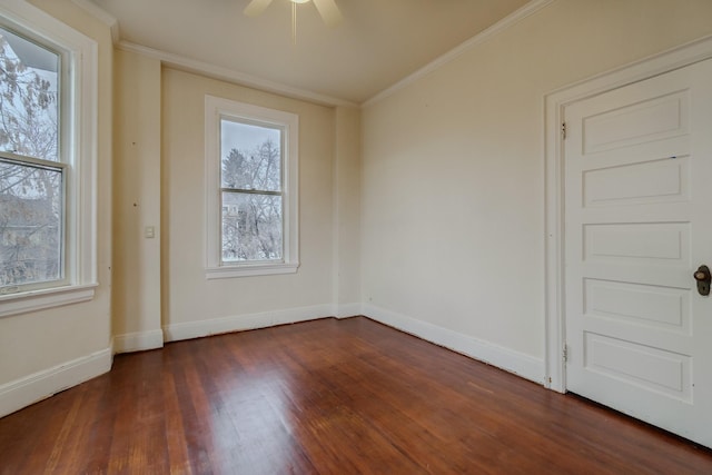 unfurnished room featuring crown molding, ceiling fan, and dark hardwood / wood-style flooring