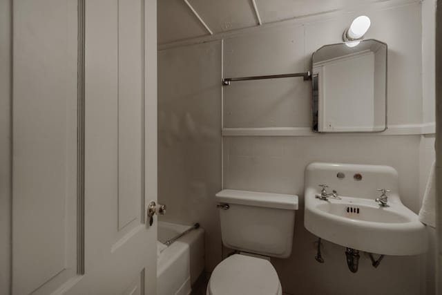 bathroom with sink and toilet