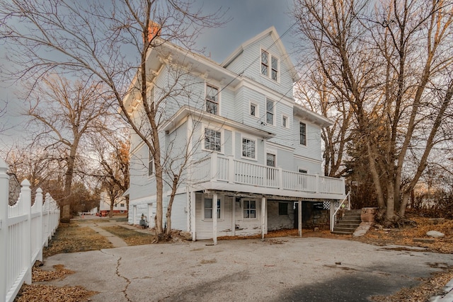 view of front of house with a deck