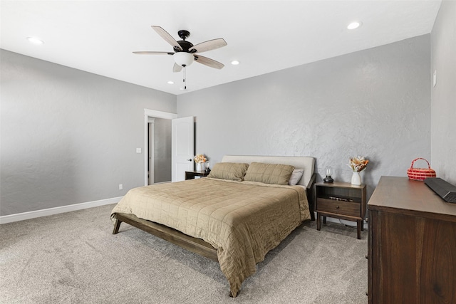 bedroom with light colored carpet and ceiling fan