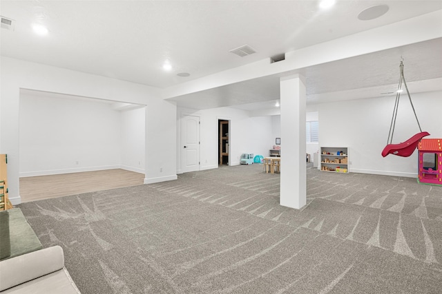 basement featuring carpet floors