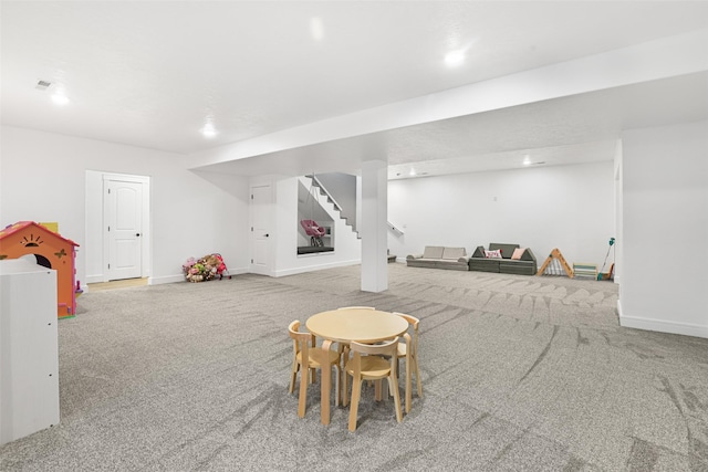 recreation room with carpet floors