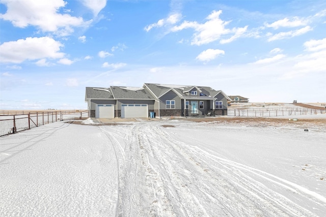 view of front of property featuring a garage