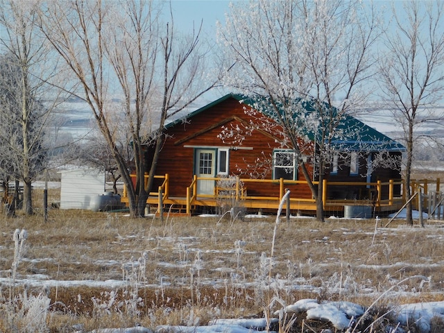 view of snow covered property