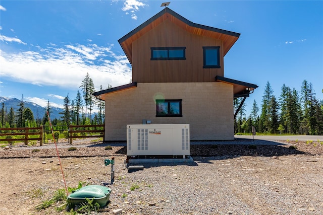 3900 Foothill Rd, Kalispell, MT 59901 - view of side of home with a mountain view