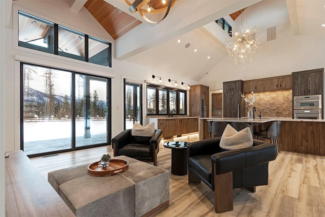 3900 Foothill Rd, Kalispell, MT 59901 - lobby featuring high vaulted ceiling, a sink, beamed ceiling, and recessed lighting