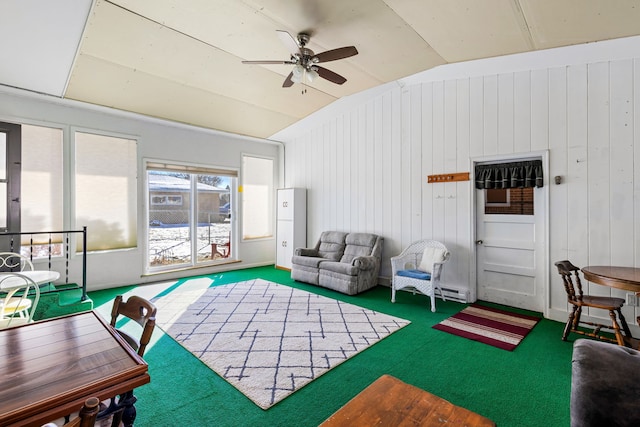 interior space featuring lofted ceiling, carpet floors, and ceiling fan