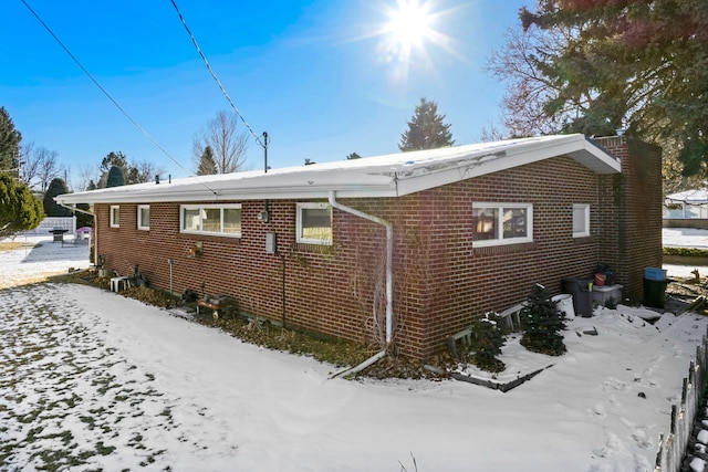 view of snow covered property