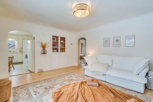 living room featuring light wood-type flooring