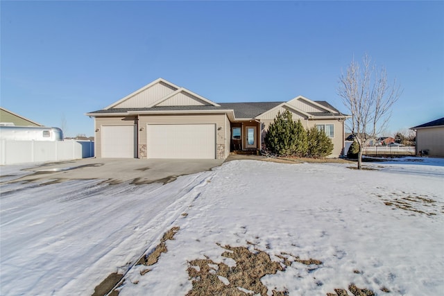 ranch-style home with a garage