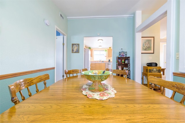 dining area featuring sink