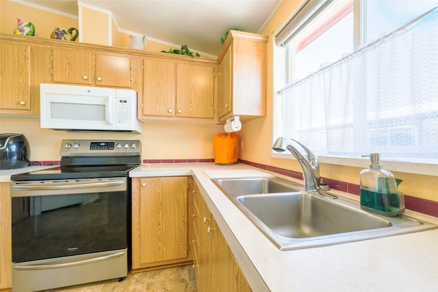 kitchen featuring sink and electric stove