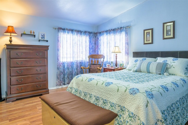 bedroom with light wood-type flooring