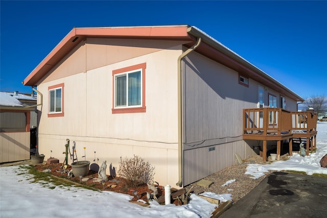 view of snow covered property