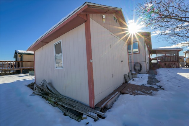 view of snow covered property