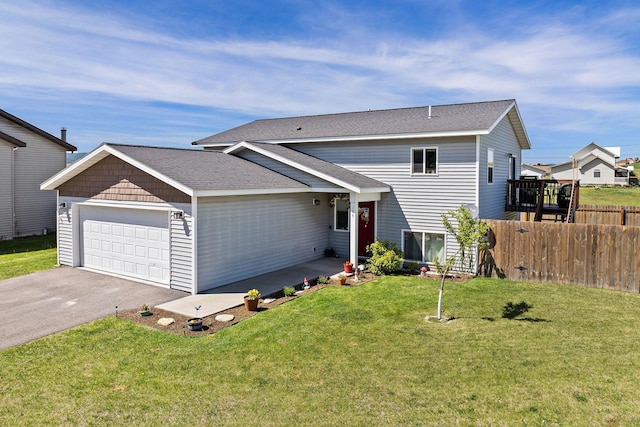 105 Lupine Dr, Kalispell, MT 59901 - view of front facade featuring a garage, asphalt driveway, and roof with shingles