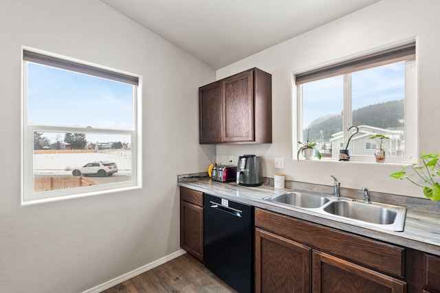 105 Lupine Dr, Kalispell, MT 59901 - kitchen featuring dark brown cabinets, black dishwasher, sink, and dark hardwood / wood-style flooring