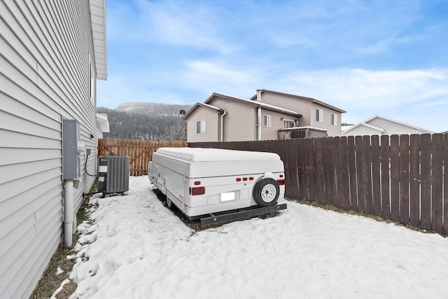 105 Lupine Dr, Kalispell, MT 59901 - view of snowy exterior with central air condition unit