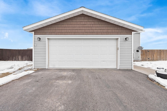 105 Lupine Dr, Kalispell, MT 59901 - view of snow covered garage