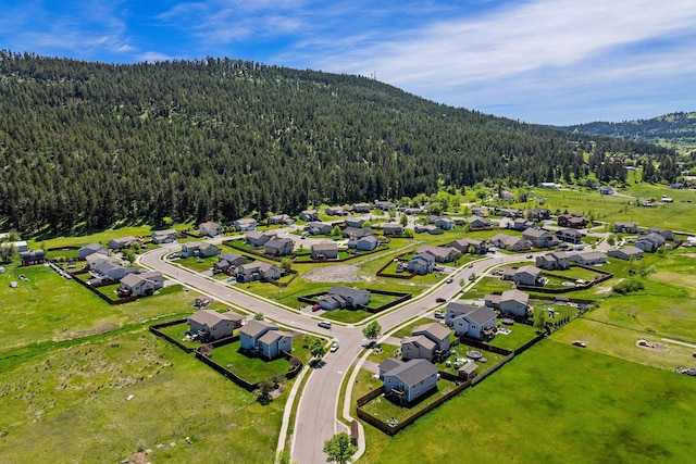 105 Lupine Dr, Kalispell, MT 59901 - aerial perspective of suburban area featuring a forest