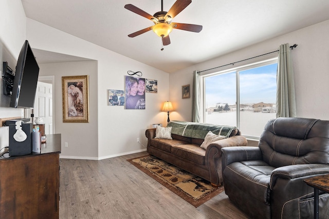 105 Lupine Dr, Kalispell, MT 59901 - living room featuring ceiling fan, lofted ceiling, and light hardwood / wood-style floors