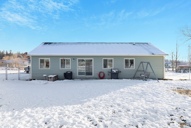 view of snow covered property